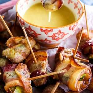 Bacon Wrapped Brussels sprouts with Hot Honey Dijon Sauce
