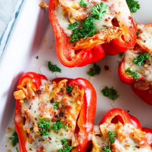 marinara chicken stuffed red bell peppers with cheese and parsley