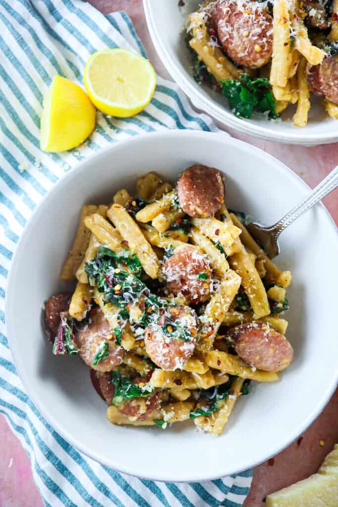 casarecci pasta with kielbasa sausage and rainbow chard with Parmesan cheese and lemon