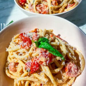 Boursin and roasted tomato pasta with shallots, parsley, garlic, and bucatini with fresh basil