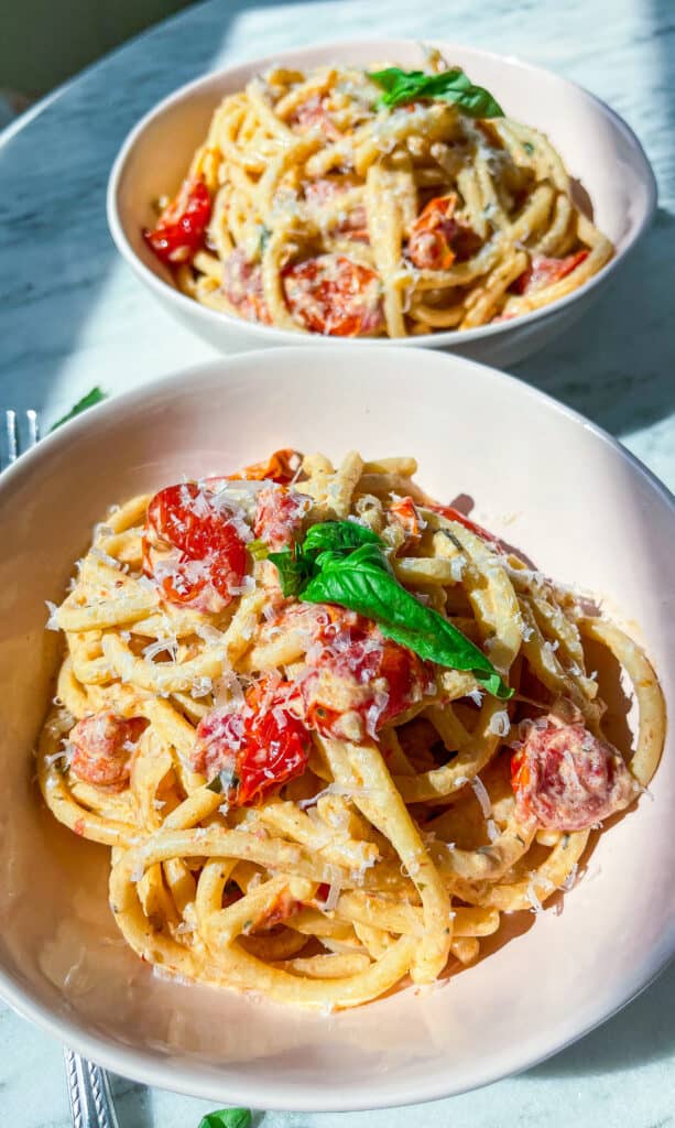 Boursin and roasted tomato pasta with shallots, parsley, garlic, and bucatini with fresh basil