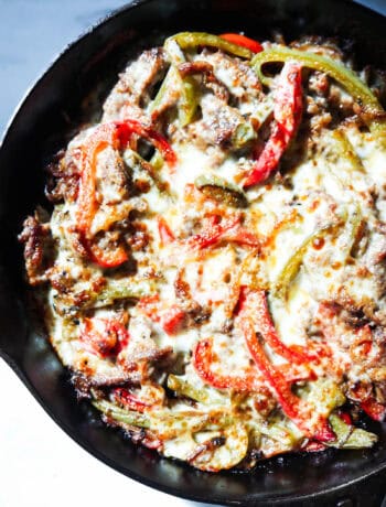 healthy Philly cheesesteak skillet with peppers onions and cheese